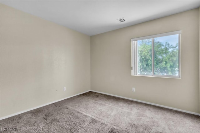 682 E Sole Addiction Ave, Las Vegas, NV 89183 - carpeted empty room with baseboards