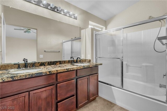 682 E Sole Addiction Ave, Las Vegas, NV 89183 - full bathroom with double vanity, shower / bath combination with glass door, and a ceiling fan