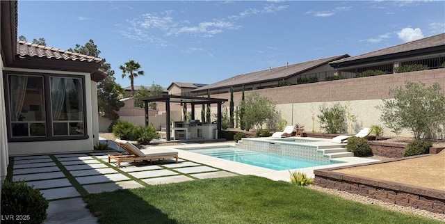 5855 Boulder Brook Ct, Las Vegas, NV 89149 - view of pool with exterior kitchen, an in-ground hot tub, a patio, and a fenced backyard