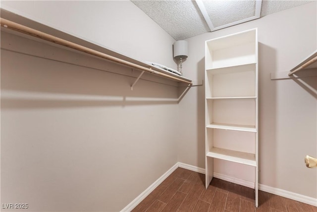 1470 Elizabeth Ave Unit 1, Las Vegas, NV 89119 - walk in closet featuring dark wood-style flooring