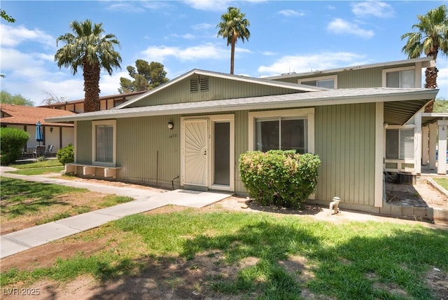 1470 Elizabeth Ave Unit 1, Las Vegas, NV 89119 - view of front facade with a front lawn