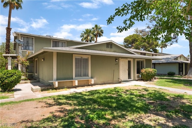 1470 Elizabeth Ave Unit 1, Las Vegas, NV 89119 - view of front facade featuring a front lawn
