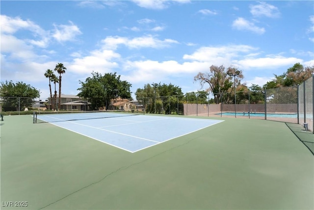 1470 Elizabeth Ave Unit 1, Las Vegas, NV 89119 - view of tennis court featuring community basketball court