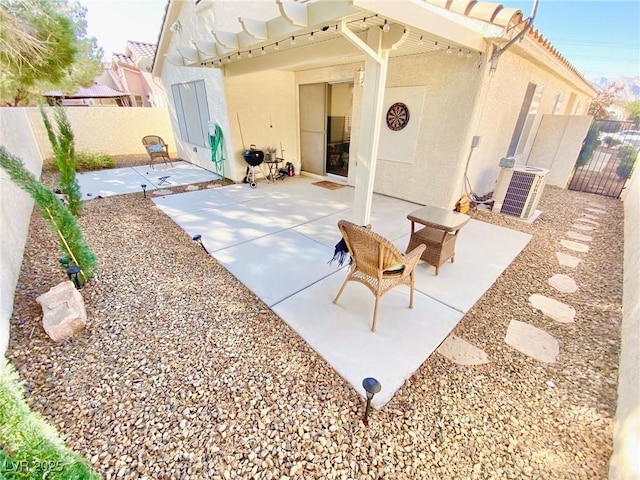 3372 Wayward Ct, Las Vegas, NV 89129 - fenced backyard featuring central AC and a patio area