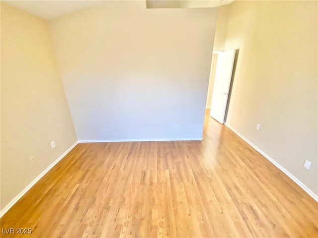 3372 Wayward Ct, Las Vegas, NV 89129 - unfurnished room featuring light wood-style floors and baseboards