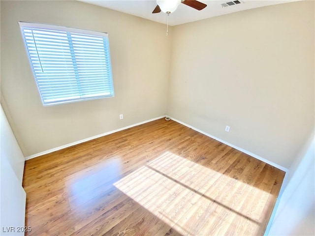 3372 Wayward Ct, Las Vegas, NV 89129 - empty room featuring a ceiling fan, wood finished floors, and baseboards