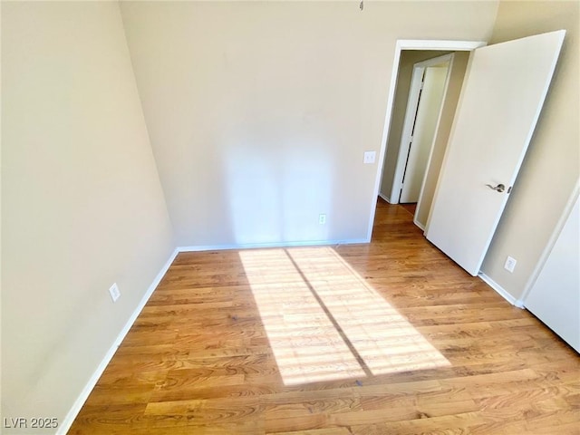 3372 Wayward Ct, Las Vegas, NV 89129 - empty room with light wood-type flooring and baseboards