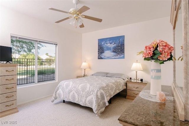 4970 Black Bear Rd Unit 101, Las Vegas, NV 89149 - carpeted bedroom featuring baseboards and a ceiling fan
