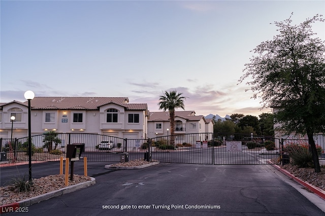 4970 Black Bear Rd Unit 101, Las Vegas, NV 89149 - view of front of property featuring a gate and stucco siding