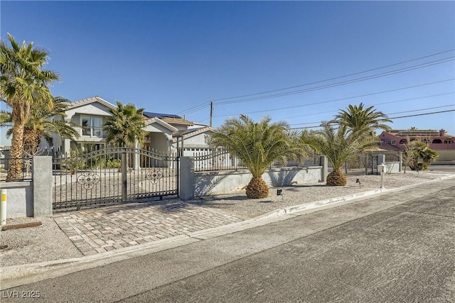2890 Belcastro St, Las Vegas, NV 89117 - obstructed view of property featuring a fenced front yard and a gate