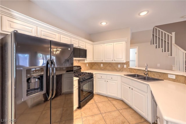 8775 Traveling Breeze Ave Unit 102, Las Vegas, NV 89178 - kitchen with refrigerator with ice dispenser, gas stove, a sink, light countertops, and recessed lighting