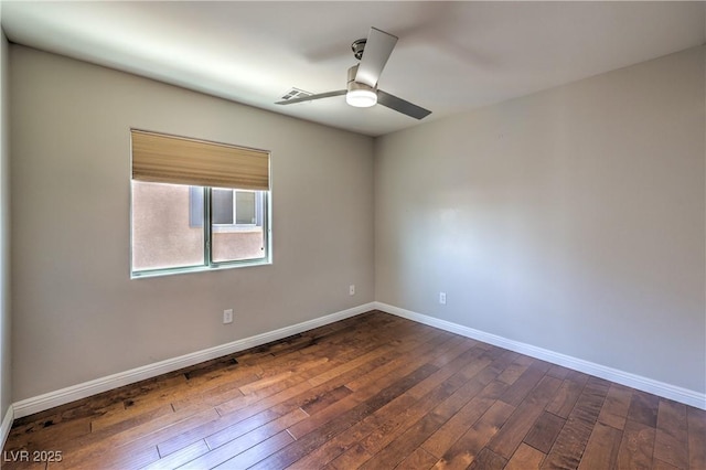 8775 Traveling Breeze Ave Unit 102, Las Vegas, NV 89178 - unfurnished room with dark wood-style floors, baseboards, and a ceiling fan