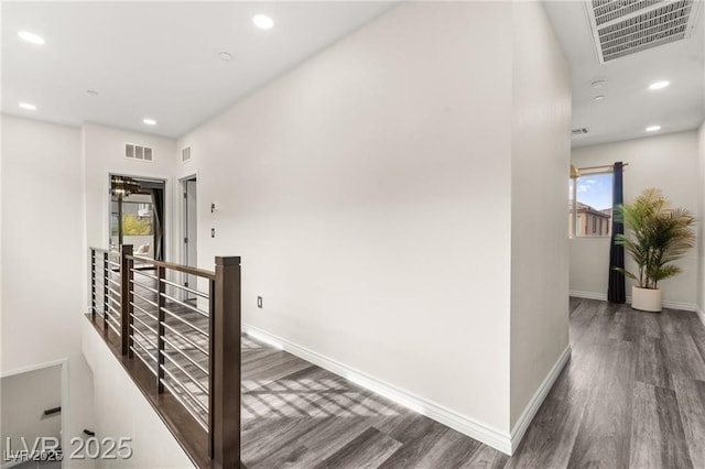 2407 Ridgeline Wash St, Las Vegas, NV 89138 - hallway with wood finished floors, an upstairs landing, recessed lighting, and baseboards