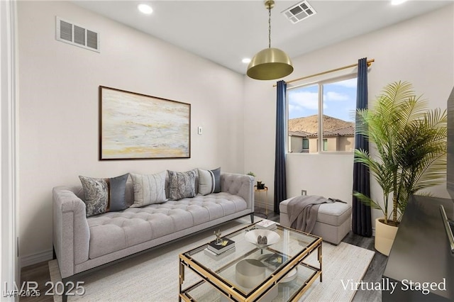 2407 Ridgeline Wash St, Las Vegas, NV 89138 - living room with recessed lighting, baseboards, and light wood-type flooring