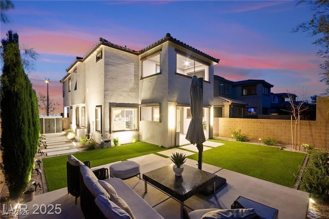 2407 Ridgeline Wash St, Las Vegas, NV 89138 - back of house with a tile roof, a patio, stucco siding, and outdoor lounge area