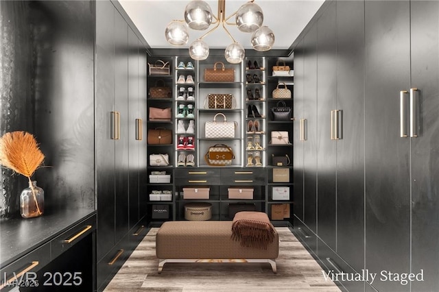 2407 Ridgeline Wash St, Las Vegas, NV 89138 - walk in closet featuring wood finished floors