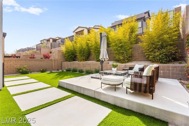 2407 Ridgeline Wash St, Las Vegas, NV 89138 - fenced backyard featuring a patio, outdoor lounge area, and a residential view