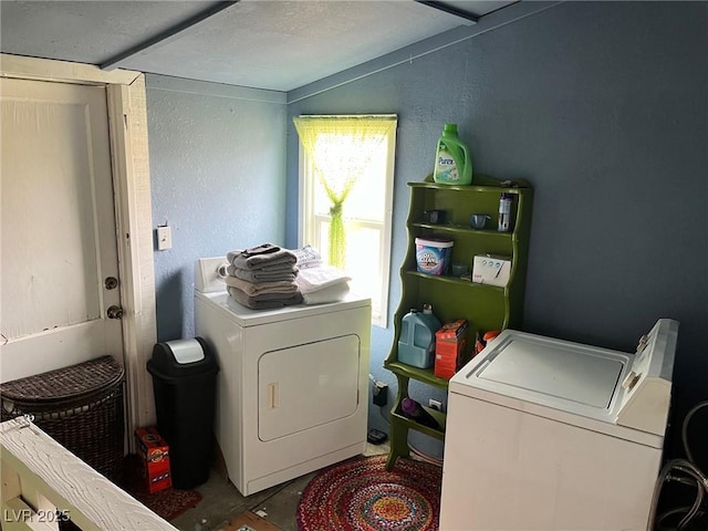 2228 Campton, Ely, NV 89301 - washroom with washer and clothes dryer and a textured wall