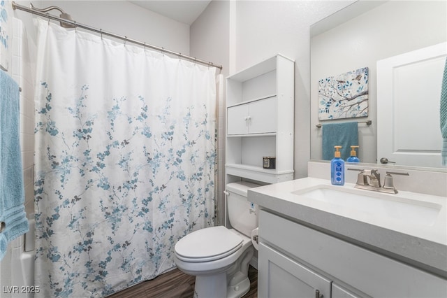 10829 Crestview Pointe Ave, Las Vegas, NV 89166 - full bath with vanity, toilet, a shower with curtain, and wood finished floors