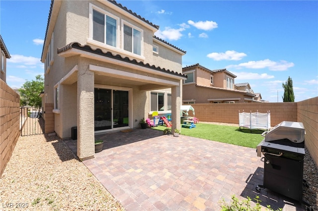 10829 Crestview Pointe Ave, Las Vegas, NV 89166 - back of property with stucco siding, a tile roof, and a patio area