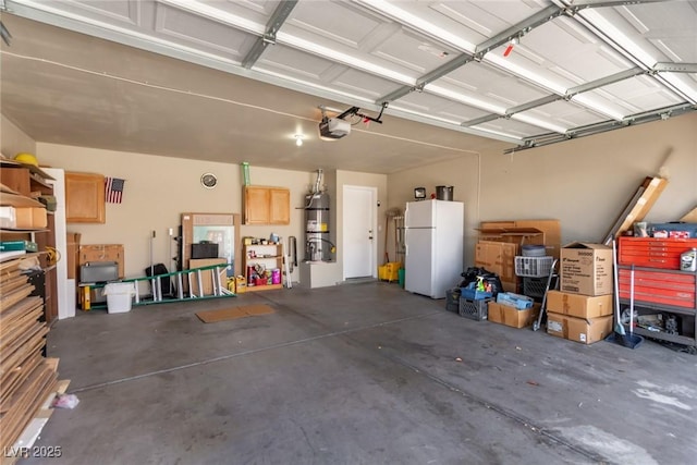 2037 Merano Ct, Las Vegas, NV 89123 - garage with freestanding refrigerator, a garage door opener, and strapped water heater