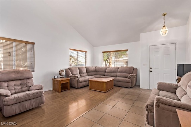 2037 Merano Ct, Las Vegas, NV 89123 - living area featuring high vaulted ceiling, light wood finished floors, and baseboards