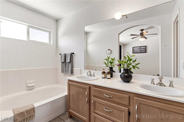 2037 Merano Ct, Las Vegas, NV 89123 - bathroom featuring double vanity, ceiling fan, and a bath
