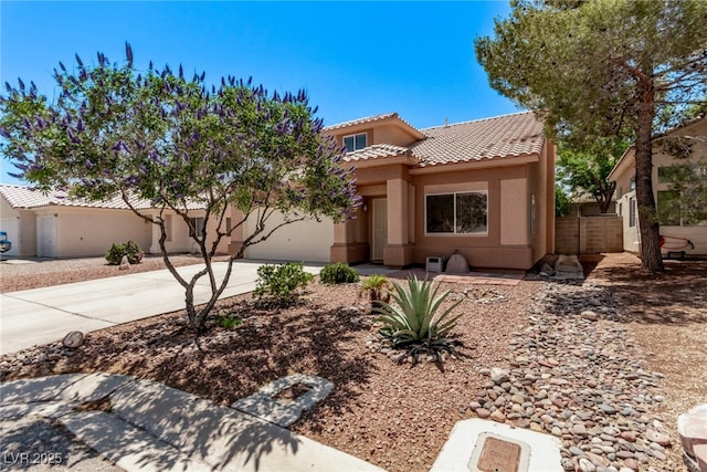 2037 Merano Ct, Las Vegas, NV 89123 - mediterranean / spanish home with driveway, a tile roof, stucco siding, and a garage