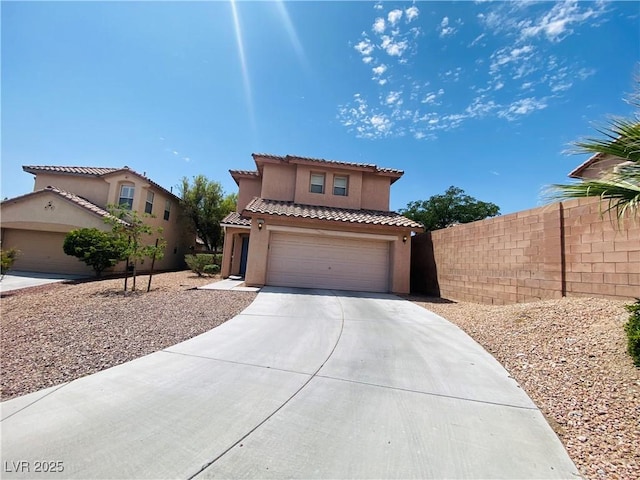11117 Okeefe Ct, Las Vegas, NV 89144 - mediterranean / spanish house with concrete driveway, stucco siding, a tile roof, and a garage
