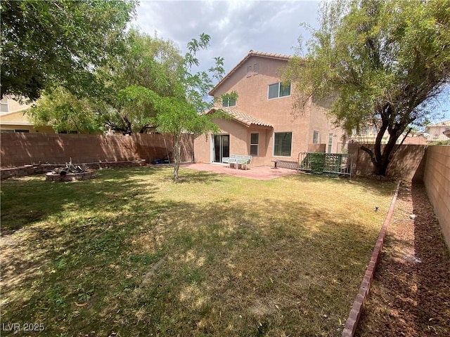 11117 Okeefe Ct, Las Vegas, NV 89144 - rear view of property featuring stucco siding, a tiled roof, and a patio