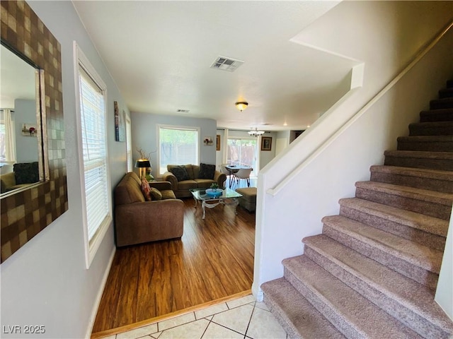 11117 Okeefe Ct, Las Vegas, NV 89144 - stairs with wood finished floors and baseboards