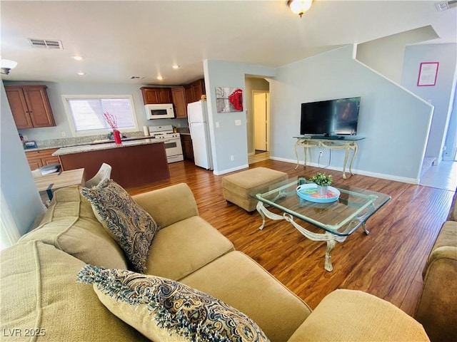 11117 Okeefe Ct, Las Vegas, NV 89144 - living room with wood finished floors, baseboards, and recessed lighting