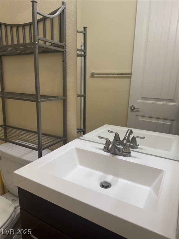 7934 Cape Flattery Ave, Las Vegas, NV 89147 - half bathroom with toilet and vanity