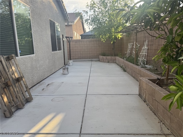 7934 Cape Flattery Ave, Las Vegas, NV 89147 - fenced backyard featuring a patio