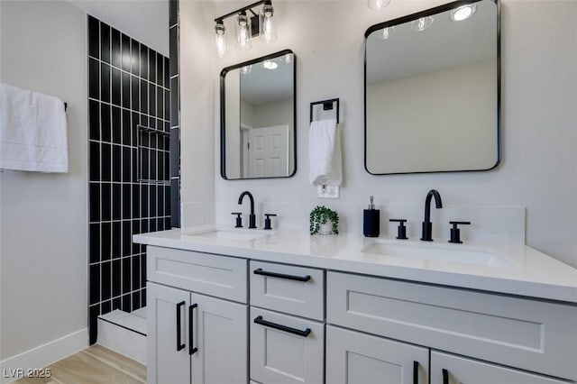 6100 Fawn Cir, Las Vegas, NV 89107 - bathroom with double vanity, walk in shower, and baseboards