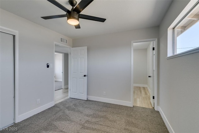 6100 Fawn Cir, Las Vegas, NV 89107 - unfurnished bedroom with carpet, ceiling fan, and baseboards