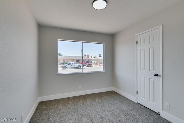 6100 Fawn Cir, Las Vegas, NV 89107 - carpeted spare room featuring baseboards