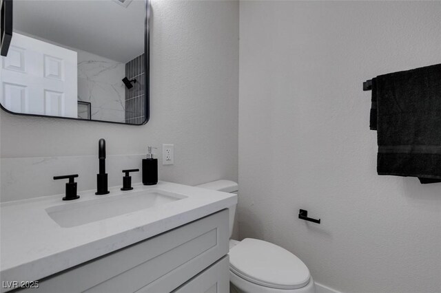 6100 Fawn Cir, Las Vegas, NV 89107 - bathroom featuring toilet and vanity