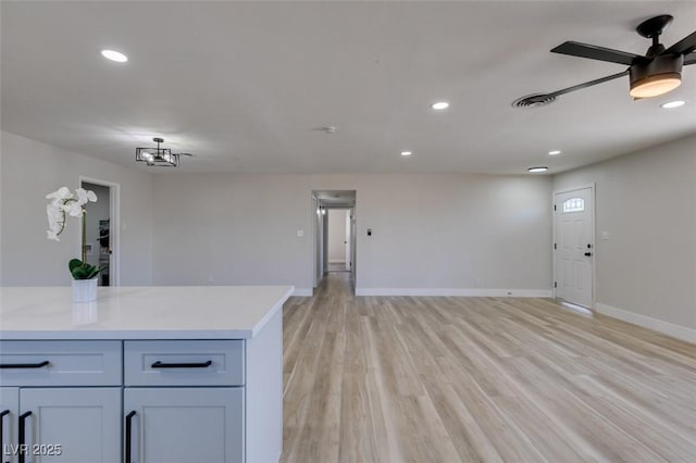 4360 El Tovar Rd, Las Vegas, NV 89115 - unfurnished living room featuring recessed lighting, baseboards, light wood-style flooring, and ceiling fan