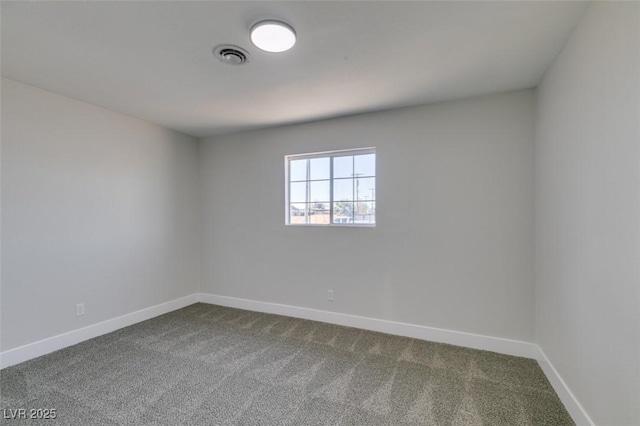4360 El Tovar Rd, Las Vegas, NV 89115 - empty room featuring dark carpet and baseboards
