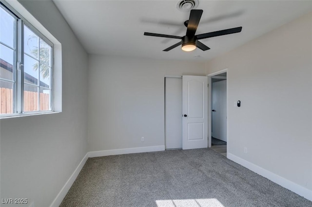 4360 El Tovar Rd, Las Vegas, NV 89115 - unfurnished bedroom featuring carpet flooring, baseboards, ceiling fan, and a closet