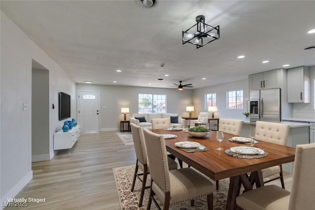 4360 El Tovar Rd, Las Vegas, NV 89115 - dining area featuring healthy amount of natural light, baseboards, recessed lighting, and light wood finished floors
