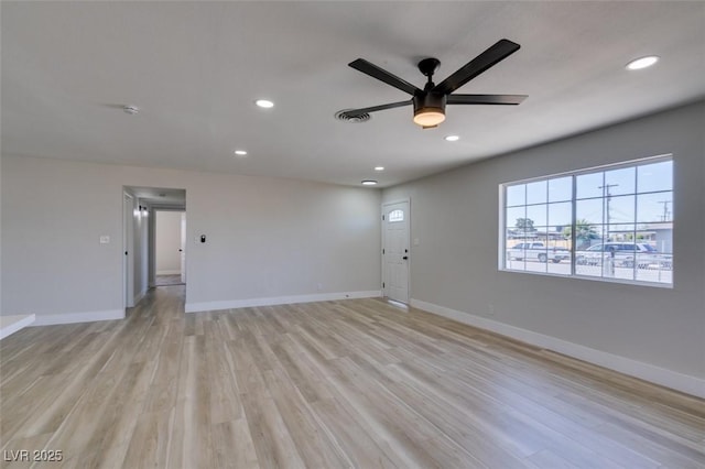 4360 El Tovar Rd, Las Vegas, NV 89115 - unfurnished living room featuring ceiling fan, recessed lighting, baseboards, and light wood-style flooring