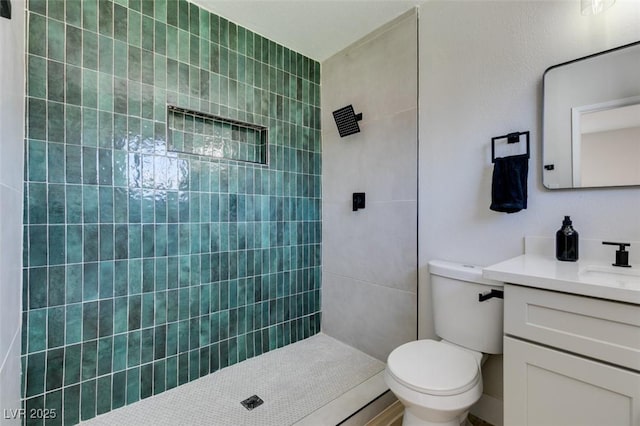 4360 El Tovar Rd, Las Vegas, NV 89115 - full bathroom with vanity, toilet, and tiled shower