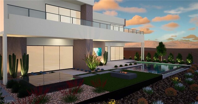 25 Canyon Bay Dr, Henderson, NV 89011 - back of house with stucco siding, a patio, and an outdoor pool