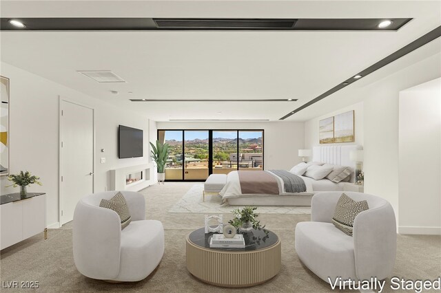 25 Canyon Bay Dr, Henderson, NV 89011 - bedroom featuring light carpet, access to outside, and baseboards