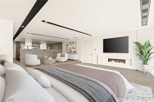 25 Canyon Bay Dr, Henderson, NV 89011 - carpeted bedroom with a warm lit fireplace