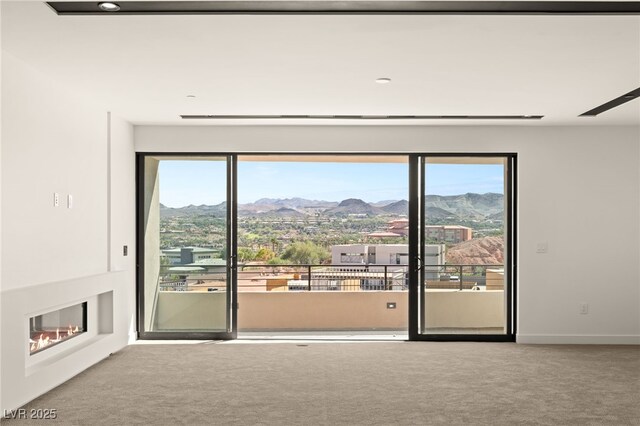 25 Canyon Bay Dr, Henderson, NV 89011 - carpeted empty room with a mountain view