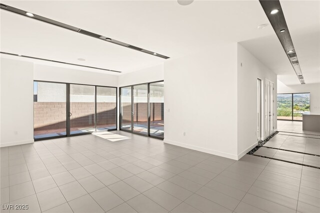 25 Canyon Bay Dr, Henderson, NV 89011 - tiled spare room with baseboards and recessed lighting
