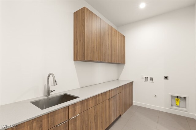 25 Canyon Bay Dr, Henderson, NV 89011 - washroom featuring electric dryer hookup, cabinet space, gas dryer hookup, washer hookup, and baseboards